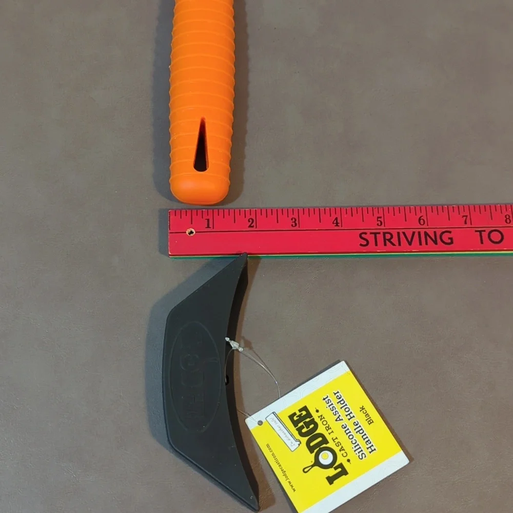 Silicone Lodge cast iron orange hot handle holder and blk assist handle holder
